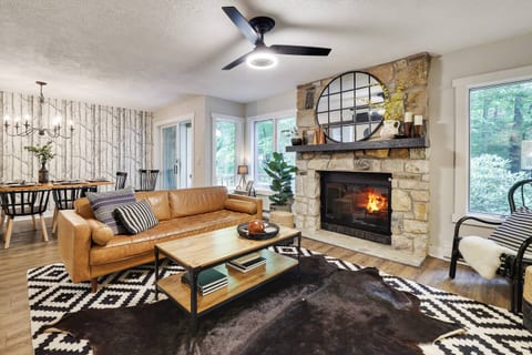After a day exploring the Poconos, gather here for family game night by the fireplace. Kids play on the rug while you finally relax with a glass of wine. Your perfect family retreat awaits.