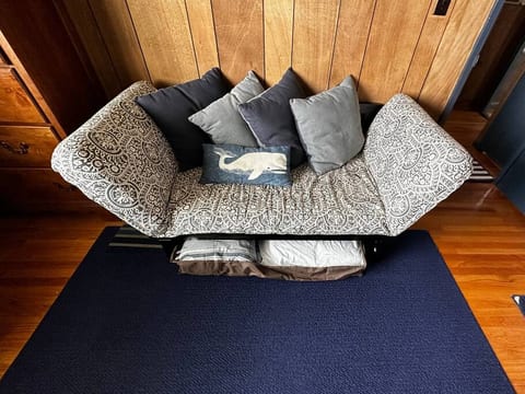 Extra bedding under the couch