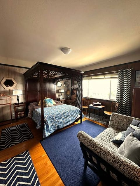 *Captain’s Room w/ ocean-view, shared bathroom*