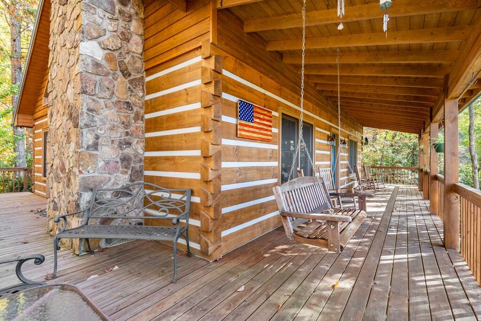 Front porch with swing and pleny of seating!