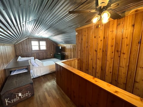 The upstairs loft space is perfect for children or a relaxing spot to read.