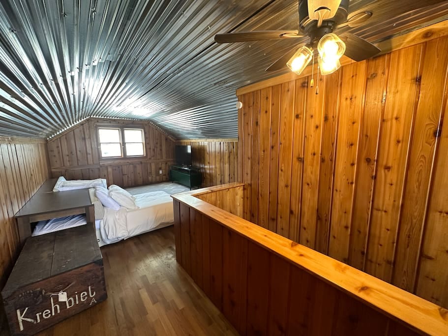 The upstairs loft space is perfect for children or a relaxing spot to read.