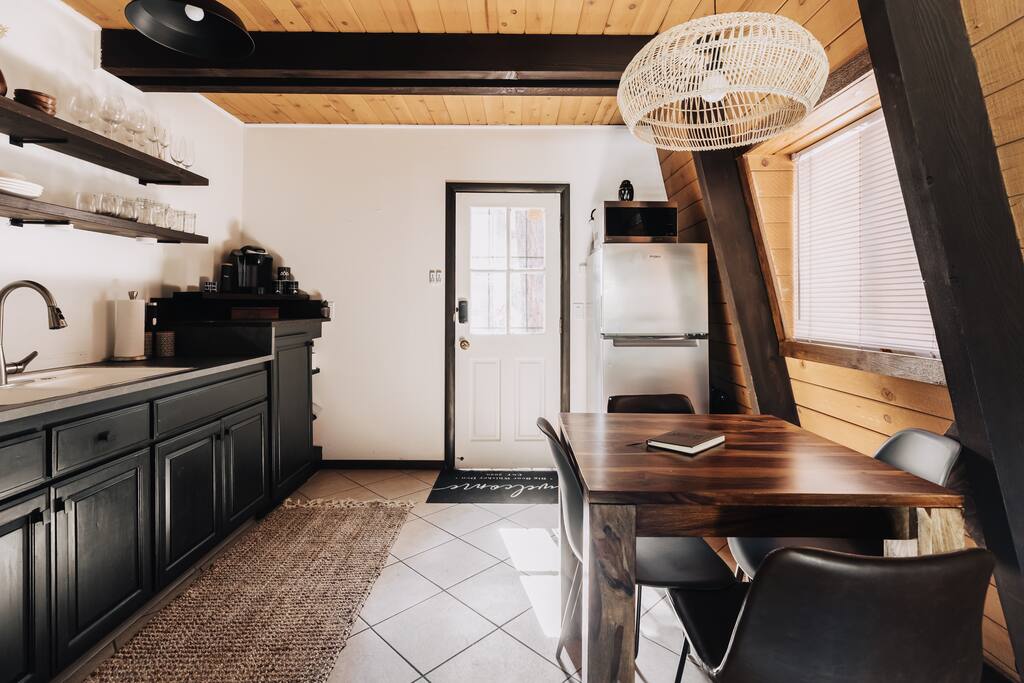 Easy access to the backyard and propane BBQ. Your cabin entry is through the back side of our property directly through this kitchen door. 