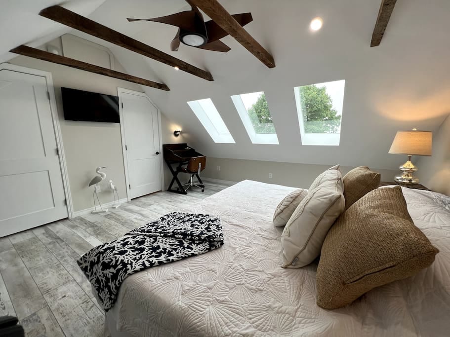 This king suite also features a dedicated work space for those who work remotely etc...