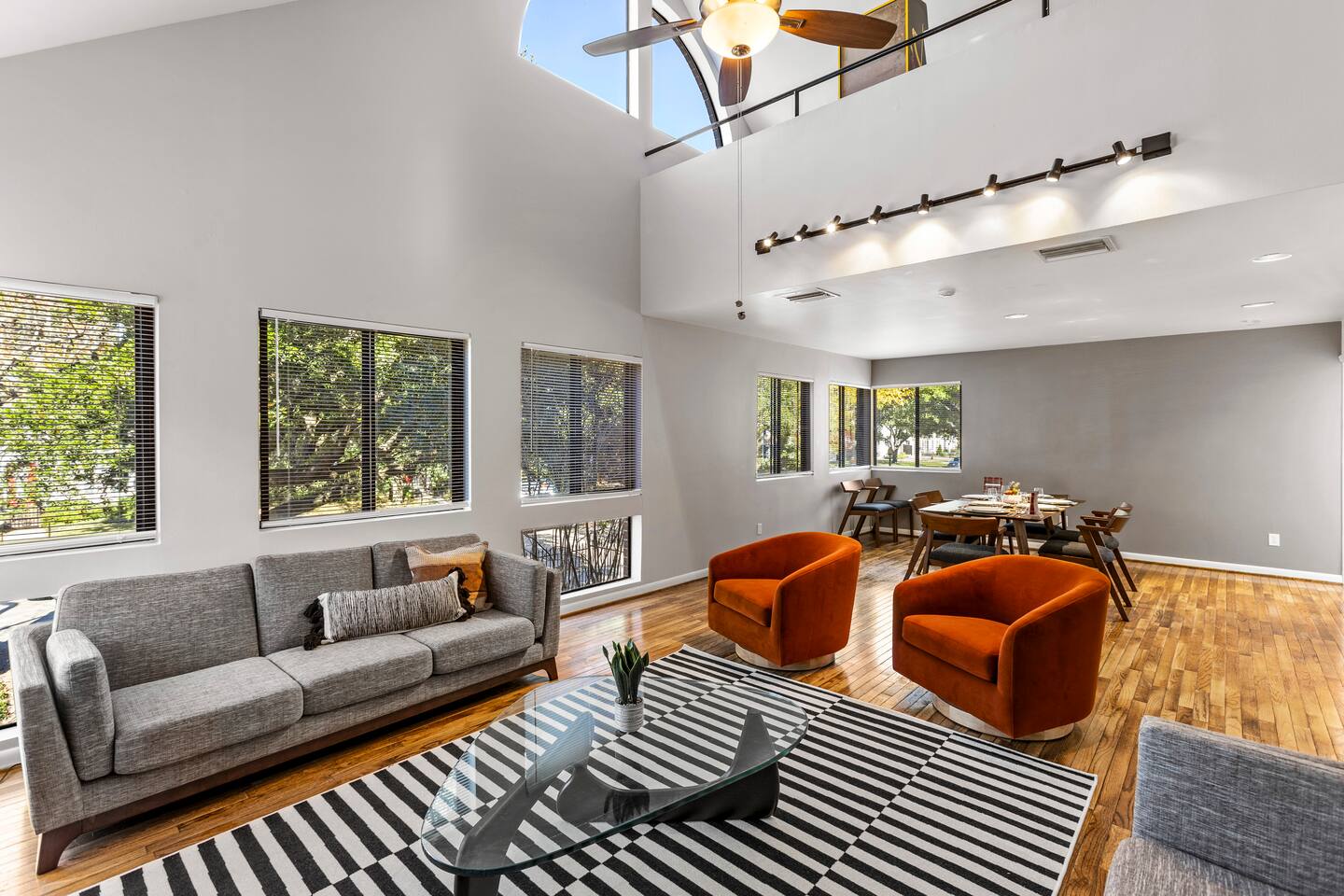 Beautiful, spacious and comfortable living room. Loads of natural light. 65" TV with high end Bose sound bar. Beautiful dining set brings family and friends together over a meal.