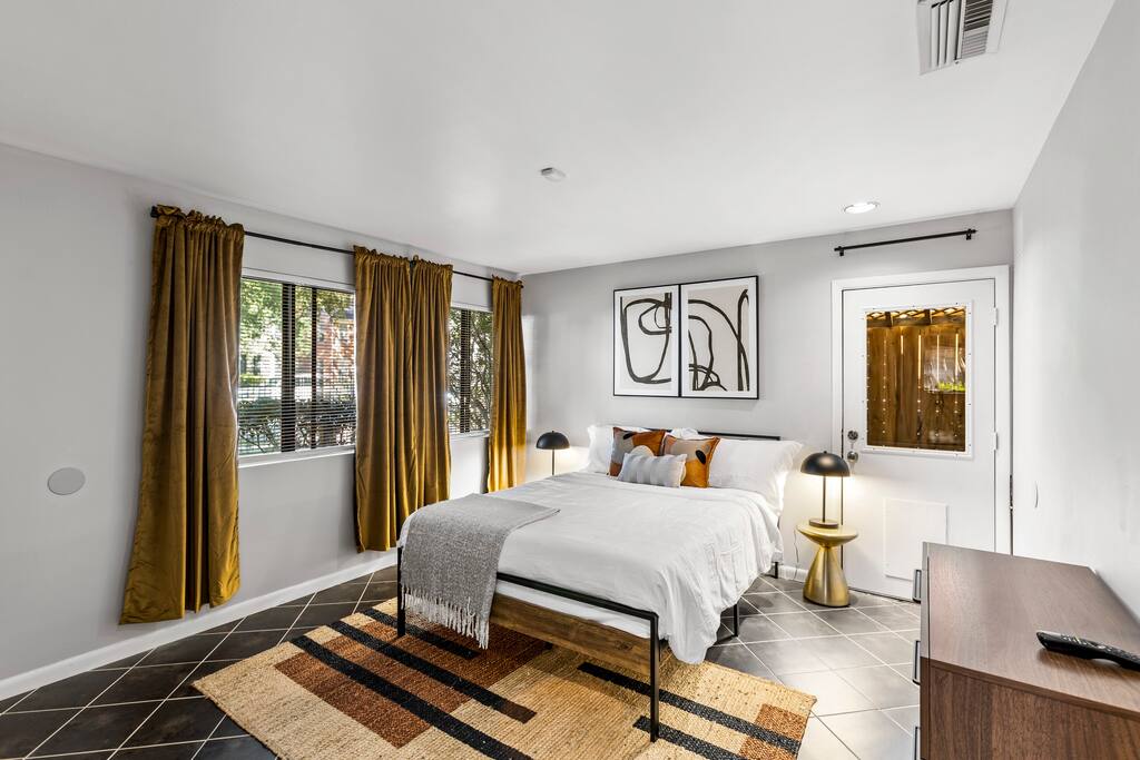 Bedroom 2 - Comfortable Queen Bed. Lamp stands. Full length mirror