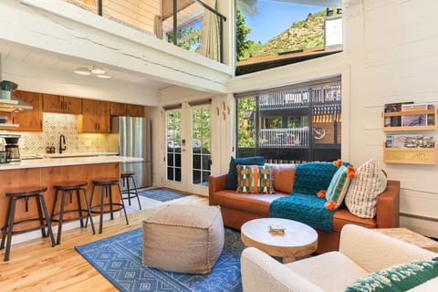 High ceilings and huge windows in the living room.