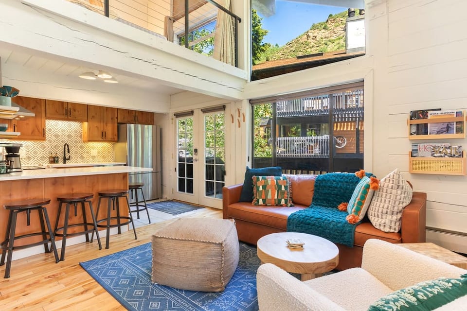 High ceilings and huge windows in the living room.