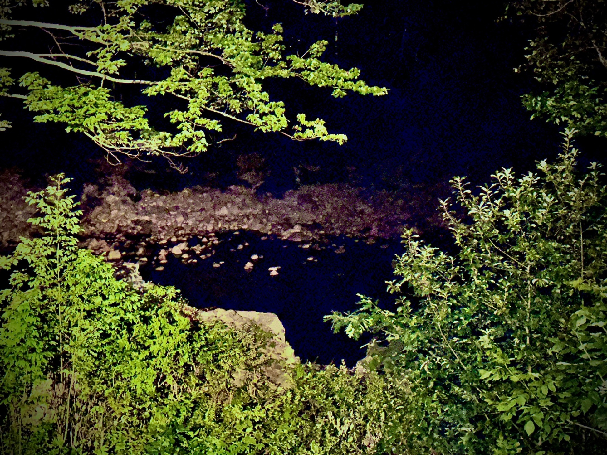 Swimhole at night taken from the deck. Night swimming with flashlights is so much fun here!