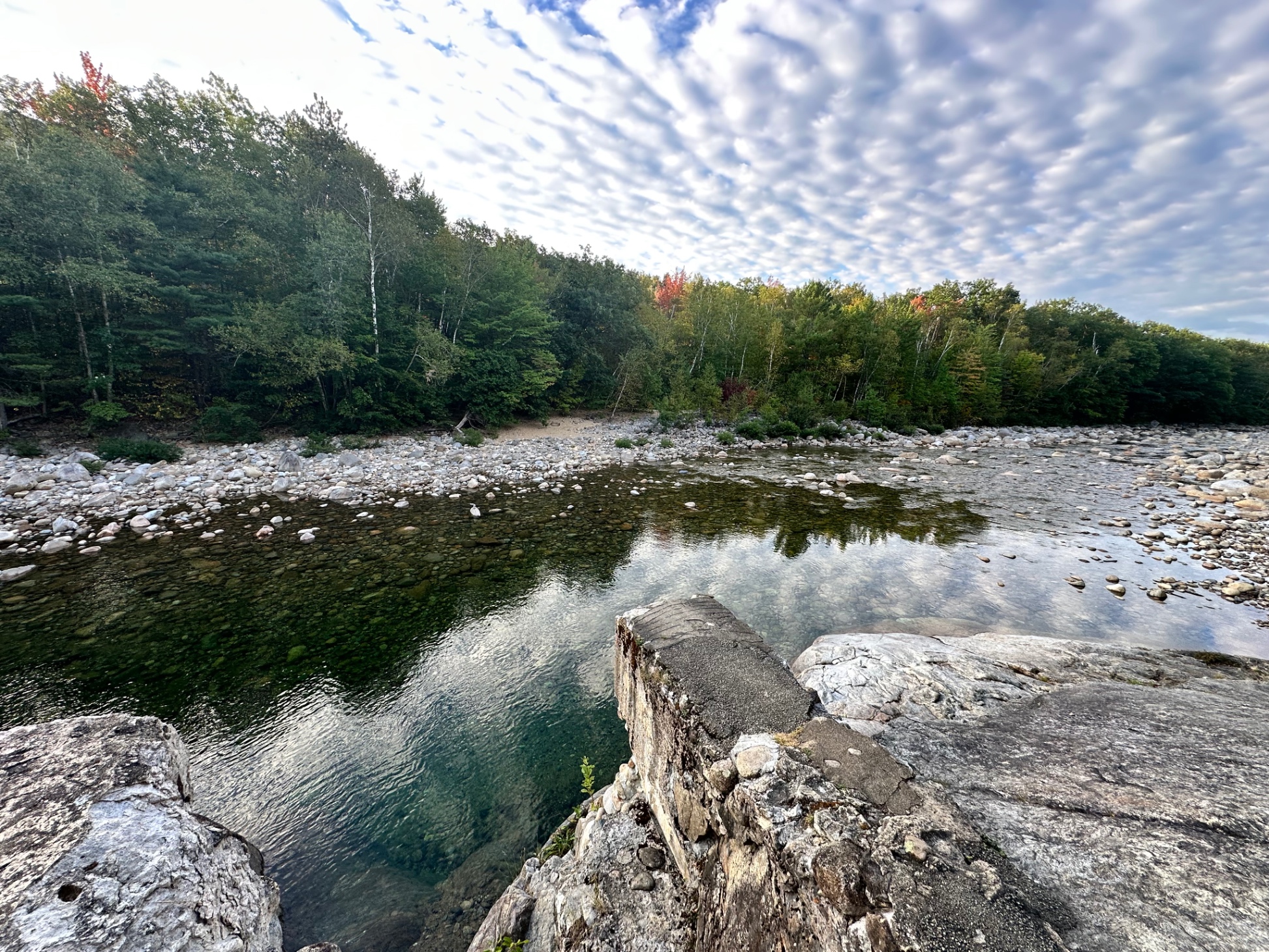 Swim hole from jump behind home .