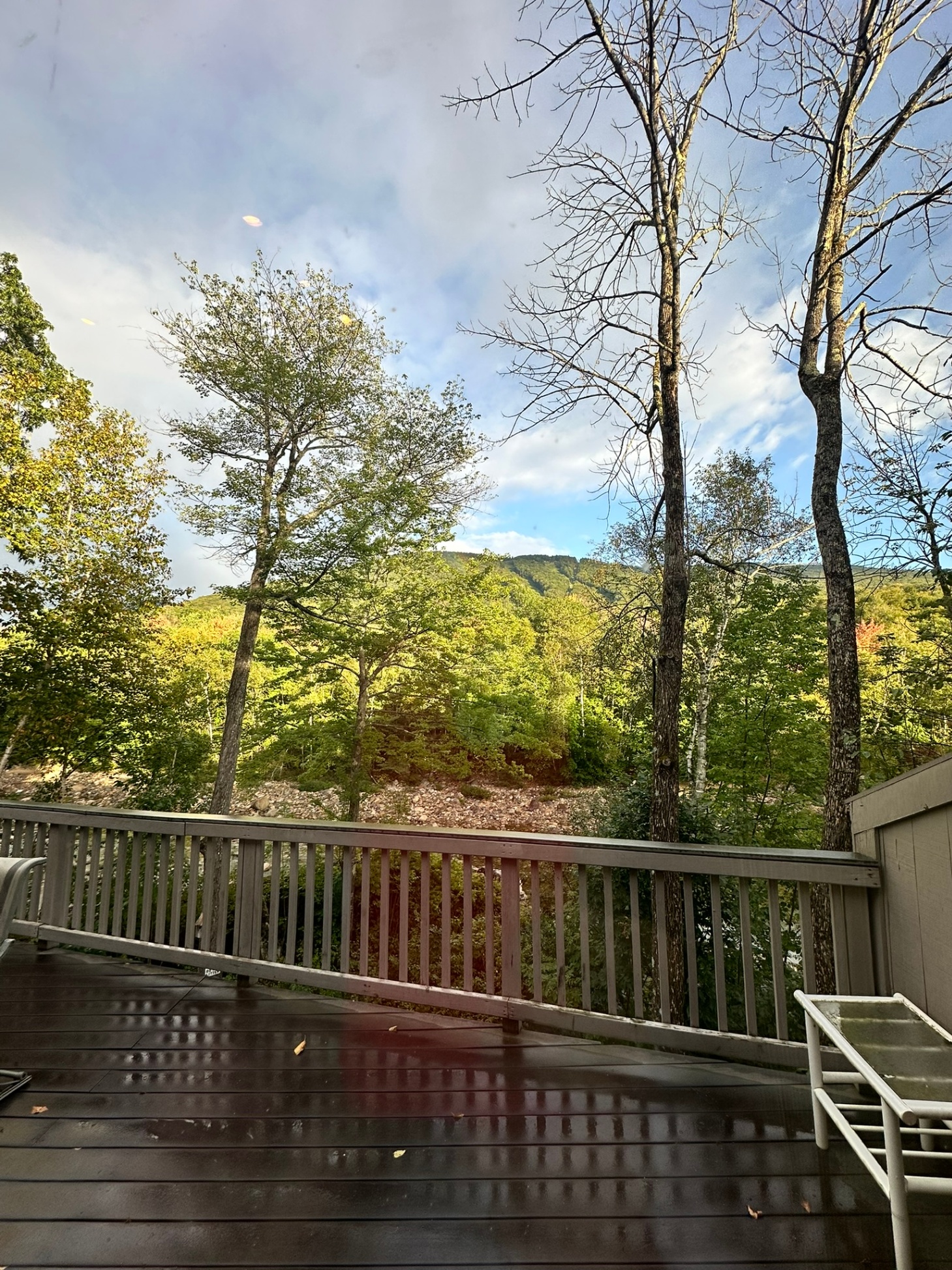 Deck overlooking the river and mountains
