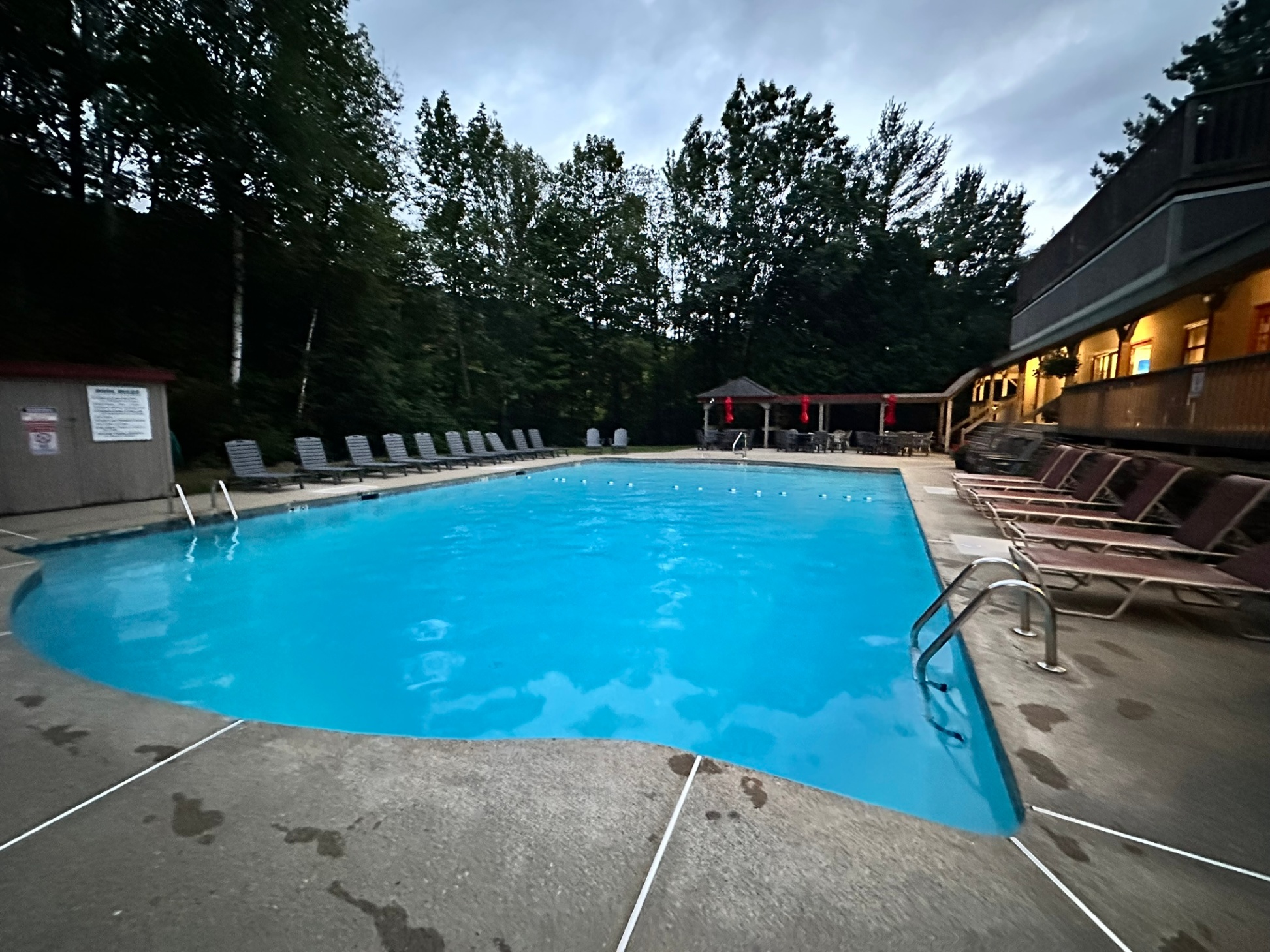 Newly renovated heated outdoor pool at the clubhouse just steps away from the house. 