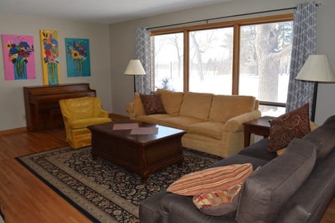 Livingroom with a spinnet piano