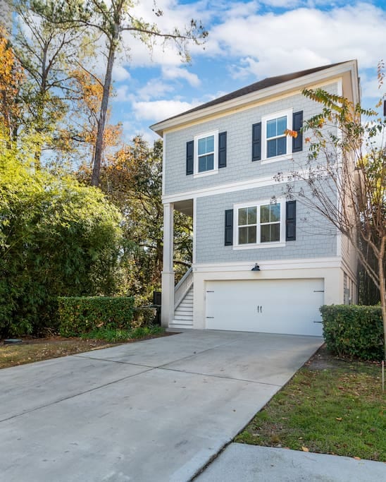 Front Exterior View, Driveway holds 4 Cars, Garage Holds Two Cars.