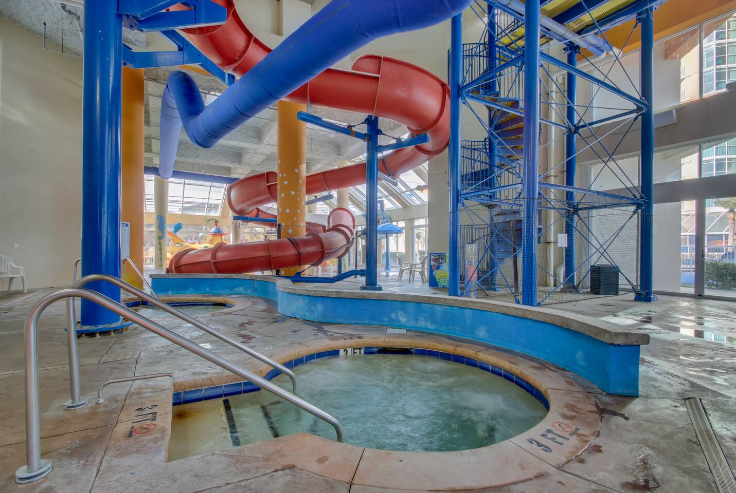 Indoor waterpark and hot tubs area
