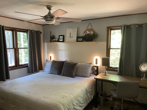 After a long day, crawl into the king-sized Tempur-Pedic and fall asleep watching your favorite movie. The mattress ensures a good night's rest. Convenient reading lights in the master allow book worms to get lost in a book before drifting off.