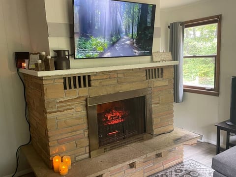 Enjoy this electric quartz heated fire place on those chilly days.