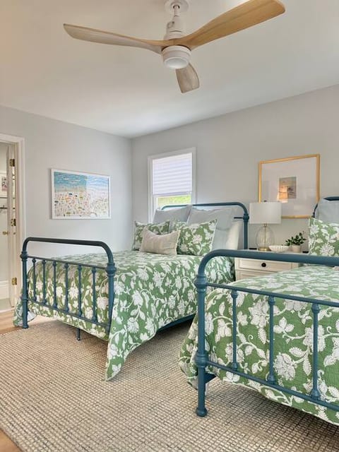 2 Double Beds with shared (full) bathroom.