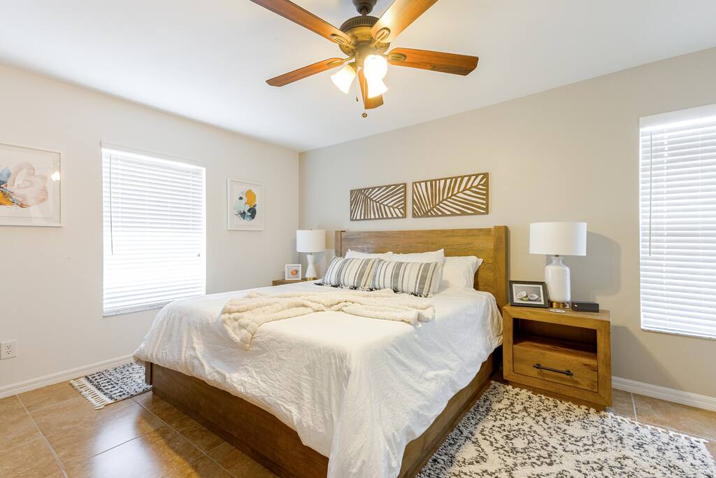 King Sized bed with premium memory foam mattress and sheets from Standard Textiles.  We also provide a firm and soft pillow for each guest.  Primary Bedroom with En Suite, double vanity, water closet, walk-in shower and closet.