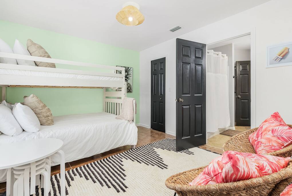 Front Guest Bedroom - Twin/Full with premium bedding & pillows for all our guests.  Walk-In Closet with hangers, (2) drawer cubby, luggage stands and robes.  Room features dimmable light and blackout curtains.  