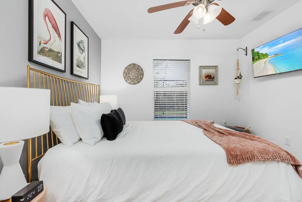 Primary Guest Room - sunset skies and a view of the pool.