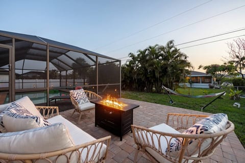 Sunset patio with seasonal fire table.  Patio can be used as an additional game play area as well