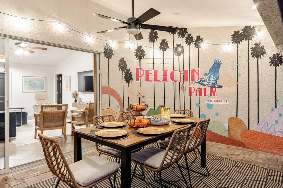 Outdoor dining Florida style just feet away from our heated pool