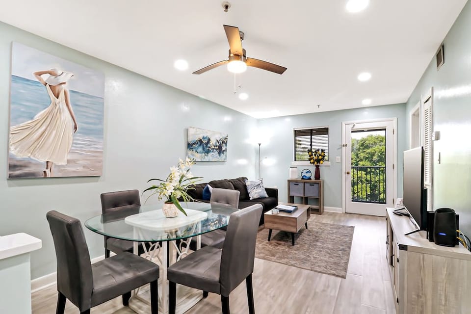 Bright and  Inviting Living Room with direct access to Private Screened Balcony

Open floor plan for kitchen, dining and living areas
