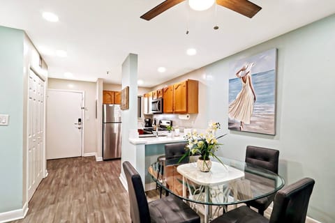 Dining table for 4 and an eating bar w/ stools for 2