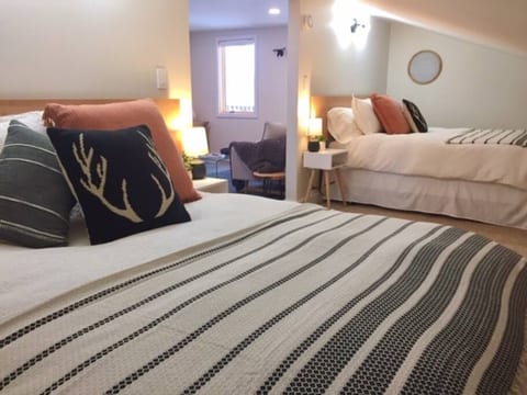 Two Queen beds with organic bedding