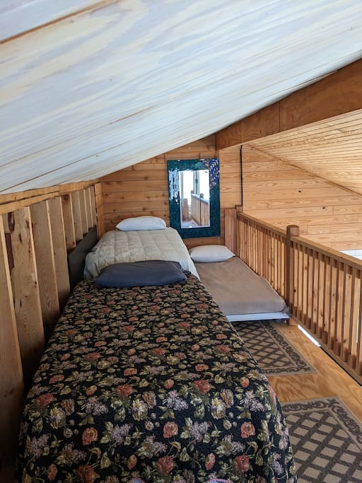 3 twin beds upstairs in Bonham cabin