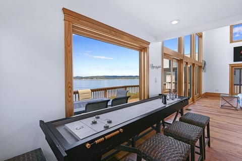 Shuffle board and tabletop bowling in the dining nook.