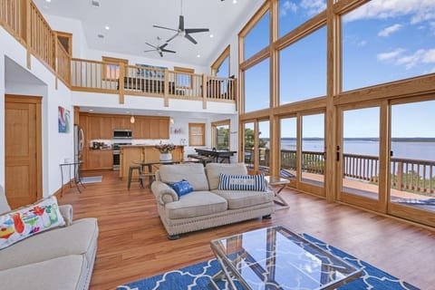 Full kitchen with buffet island, dining table, and shuffleboard!