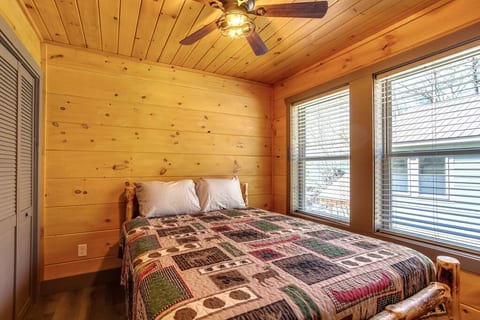 BR 2, upstairs.  Has a Queen Bed and a large closet. TV
