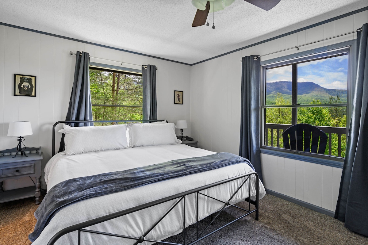 Lower guest suite with king bed and connected full bathroom