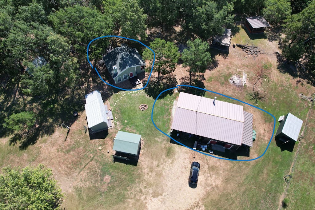 Circled in blue is the Main Cabin (on the left) and the Mess Hall (on the right).  There are two firepits available.