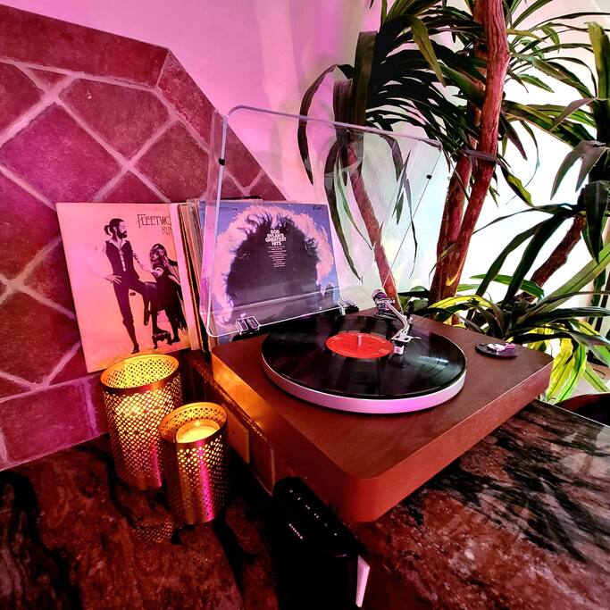 Bluetooth record player with 70s and 80s classics - Beachfront Dream Condo & Heated Pool! - Corpus Christi