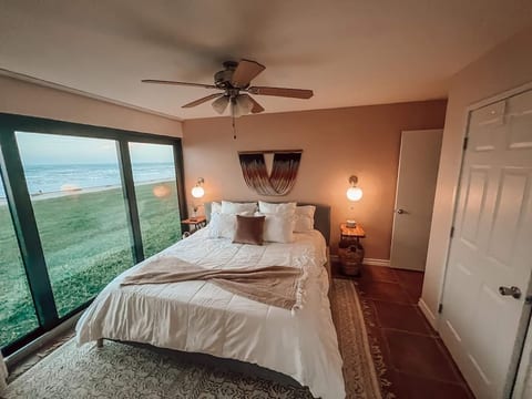 Serene and private suite with king bed and large bathroom.