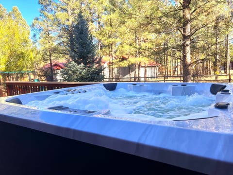 Enjoy the view on the greenery in our outdoor hot tub