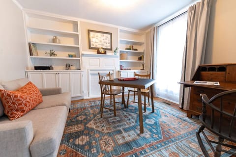 The library/game room provides another living space where the group can gather for board games, puzzles, and bingo while listening to a variety of retro records.