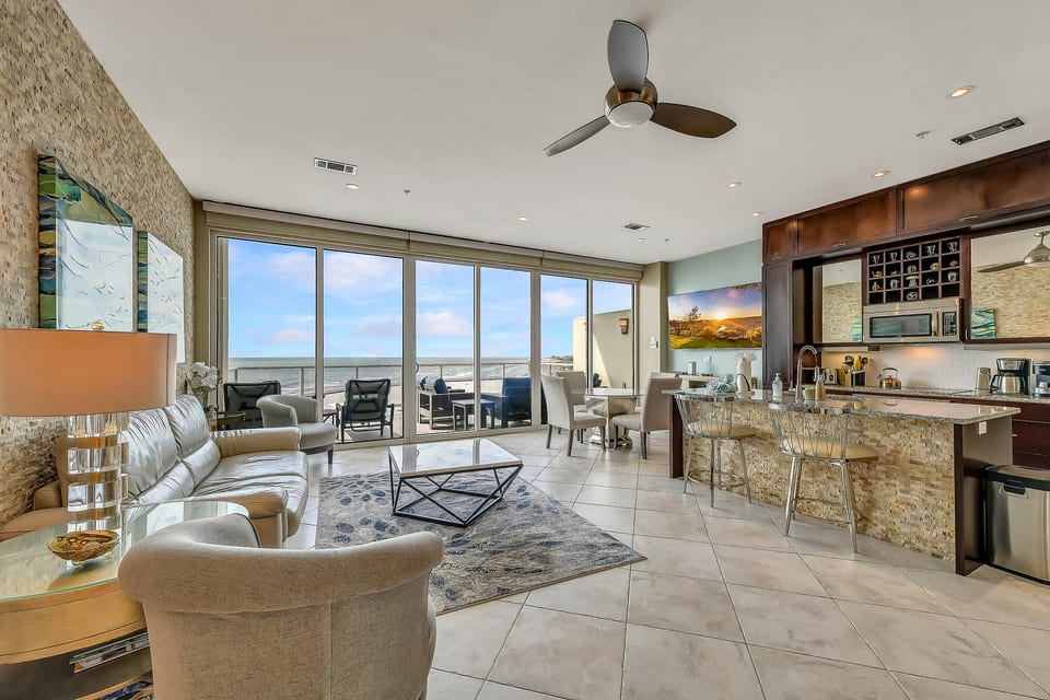 Oversized living, 200 sq ft!  Plenty of room to spread out and relax.  Indoor dining area and balcony with a view!