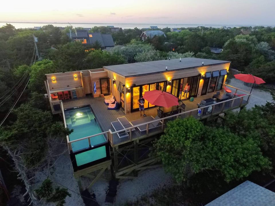 Where your summer begins—this is Windows on the Sea, just steps from the ocean & designed for effortless days by the pool, sunset cocktails on the deck, and unforgettable memories with your favorite people.