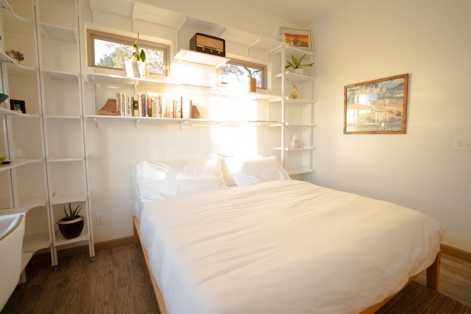 12 foot ceilings give the bedroom a spacious, airy feel.