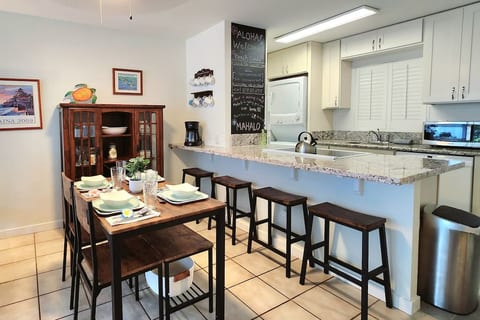 Plenty of seating around the kitchen and the dinning table for family meals and socializing