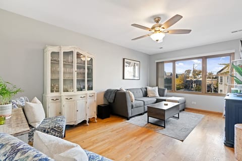 Spacious front living room as you enter through the front door.
The coffee table has storage with both blankets and puzzles / games. You might find the tv and sound bar controllers in here as well.
