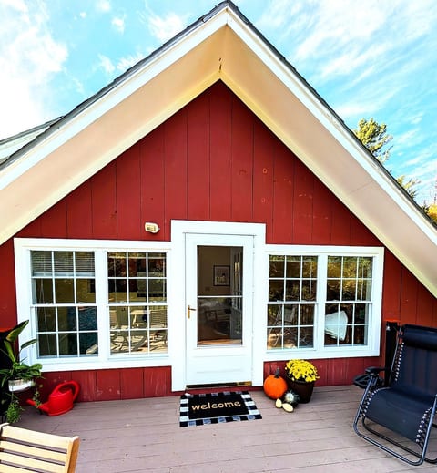 Private entrance with a spacious deck nestled high among the trees—perfect for savoring your morning coffee, soaking in the fresh Vermont air, or enjoying the peaceful silence.