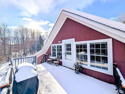 Back deck of the Alpine Suite on a sunny winter day.