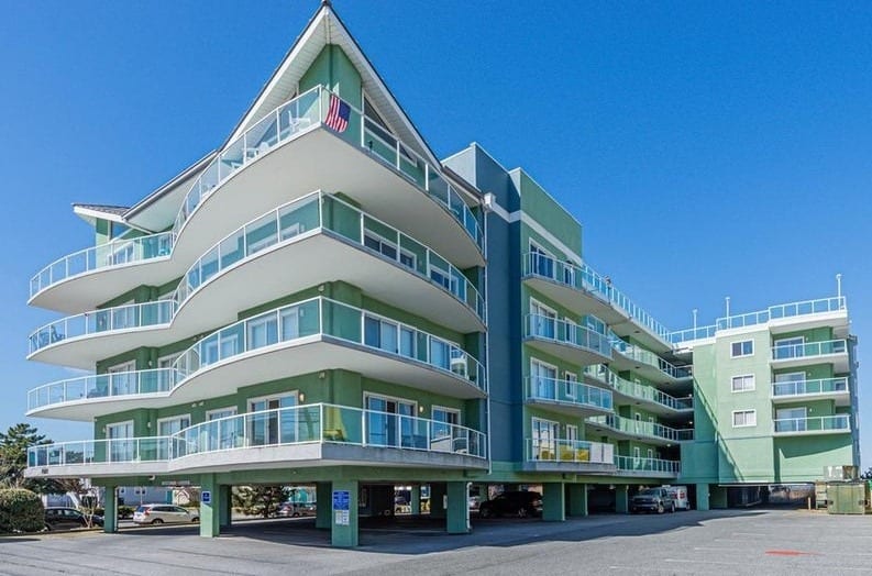 Coral Seas Condo Building and parking area looking west.