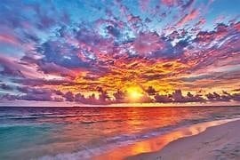 Sun setting in the west at the Ocean City beach.