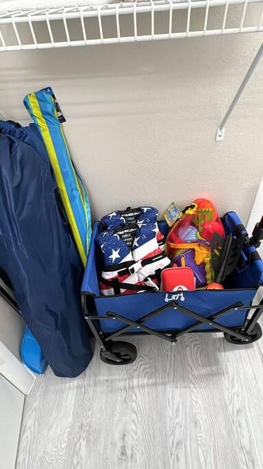 Beach essentials including beach chairs, umbrella, kids life-jackets, beach toys and even sand toys, etc.